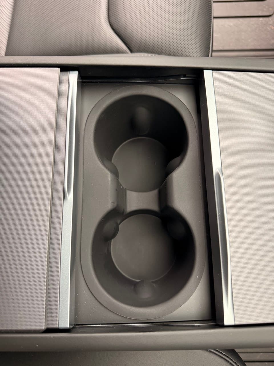 Cup holder insert installed — clean textured surface
