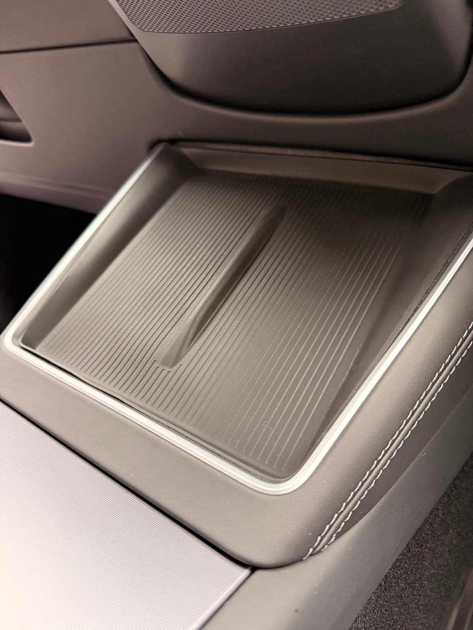 Wireless charging area before — bare plastic surface