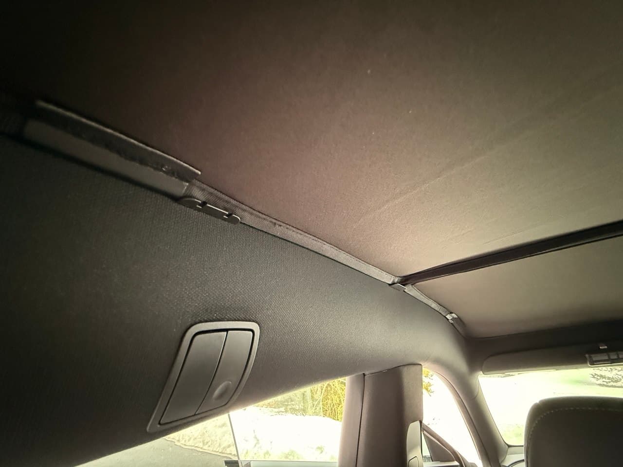 Close-up of the clip mounting mechanism near the reading light