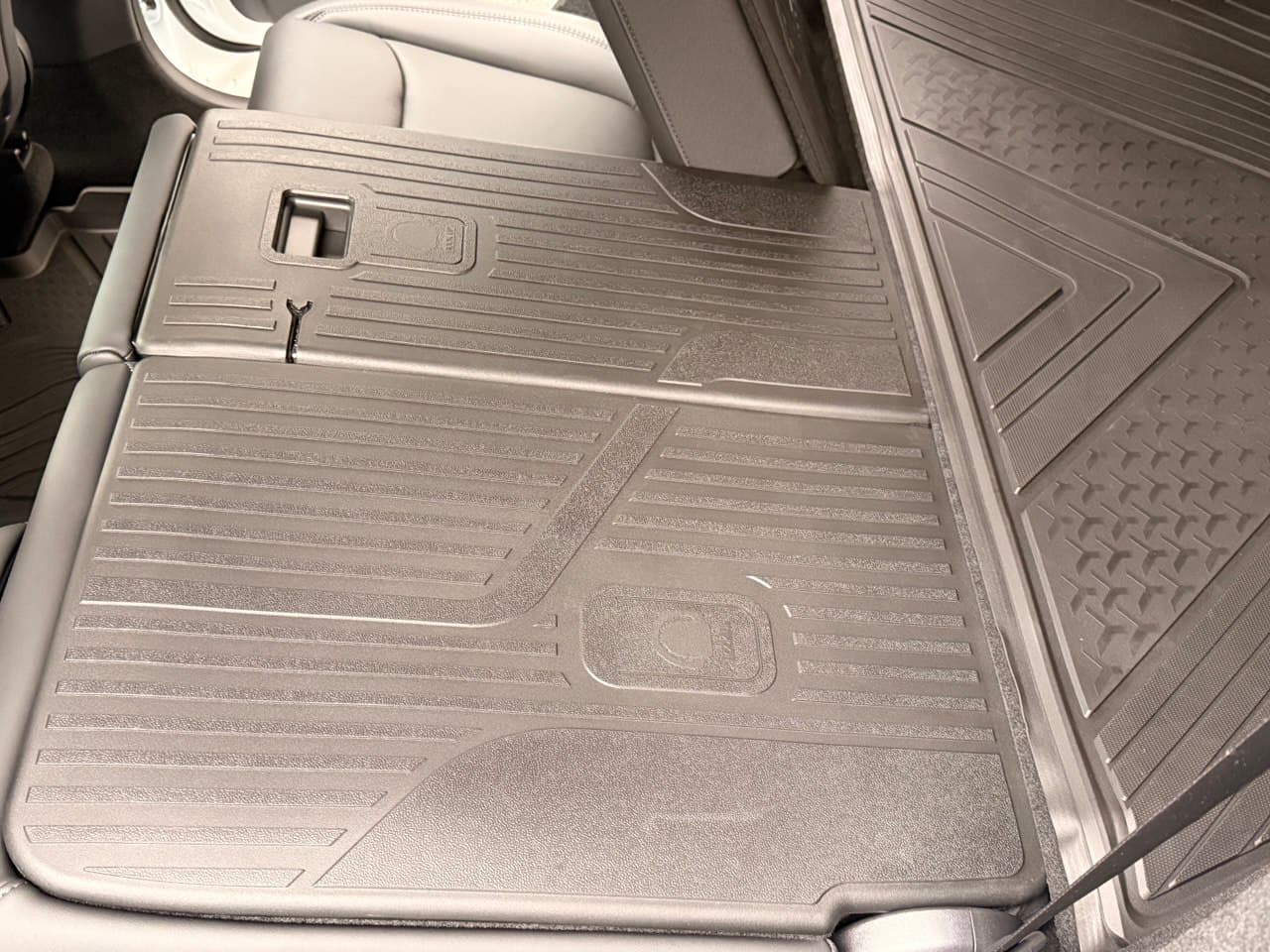 3W seat-back protector alignment in rear cargo area