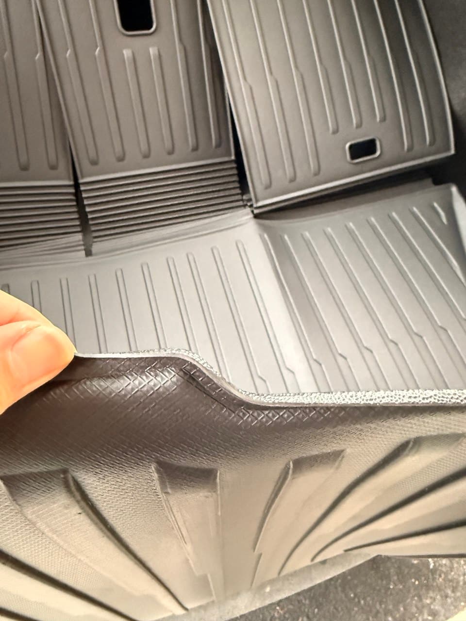 Budget cargo floor mat showing crease tradeoff
