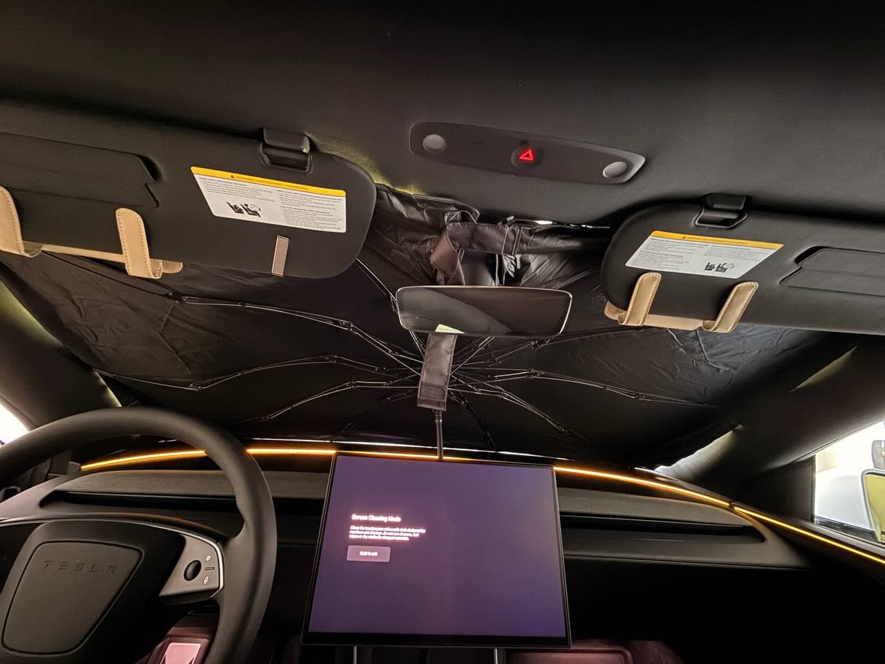 DooGooCoo windshield sunshade installed inside a Tesla Model Y