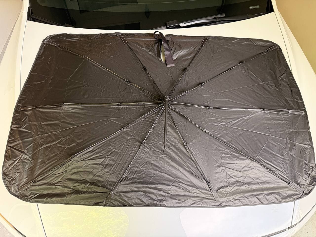 DooGooCoo windshield sunshade opened outside the Tesla