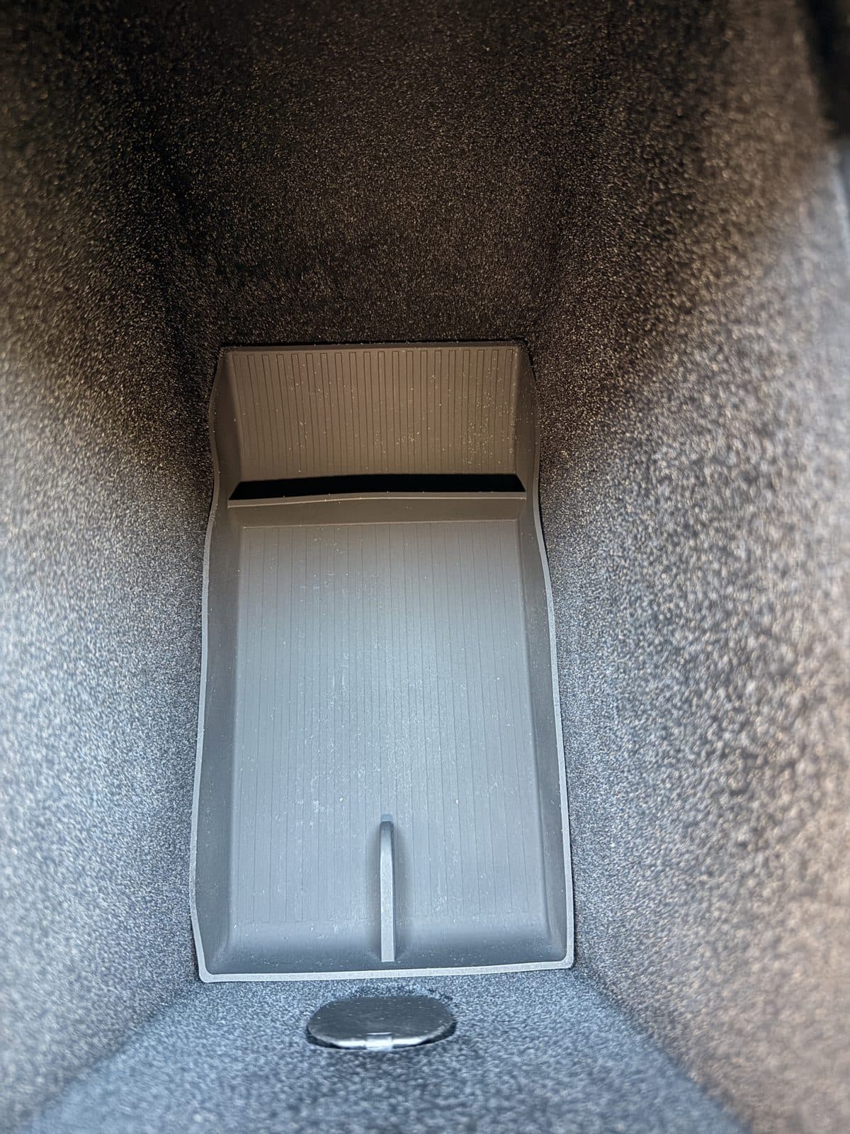 SUMK ribbed silicone bottom liner fitted in a Model Y Juniper console bin