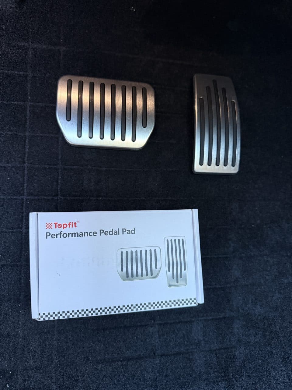 TOPFIT performance pedal pad set with aluminum brake and accelerator covers next to the retail box